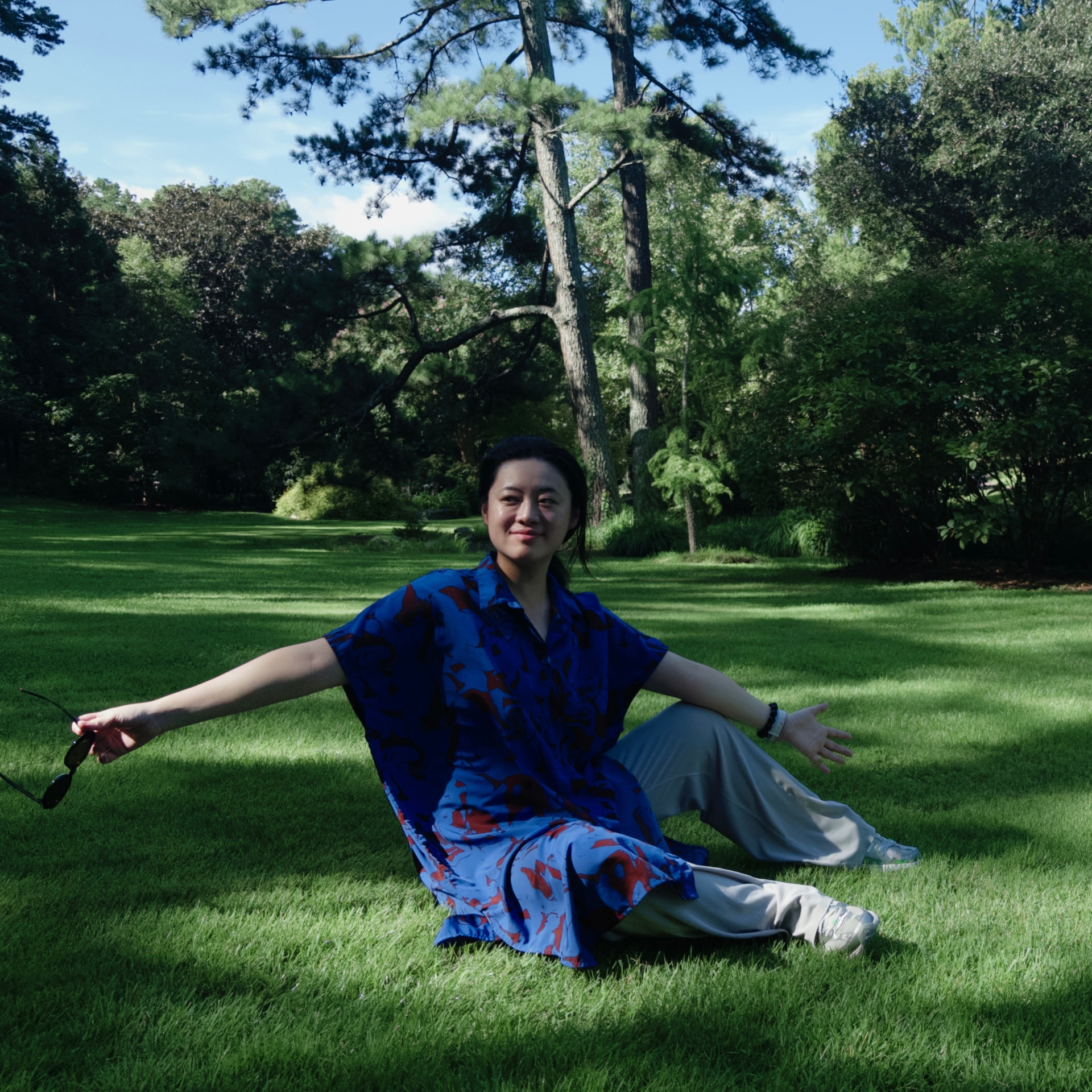 Portrait of Gamma sitting on a lawn